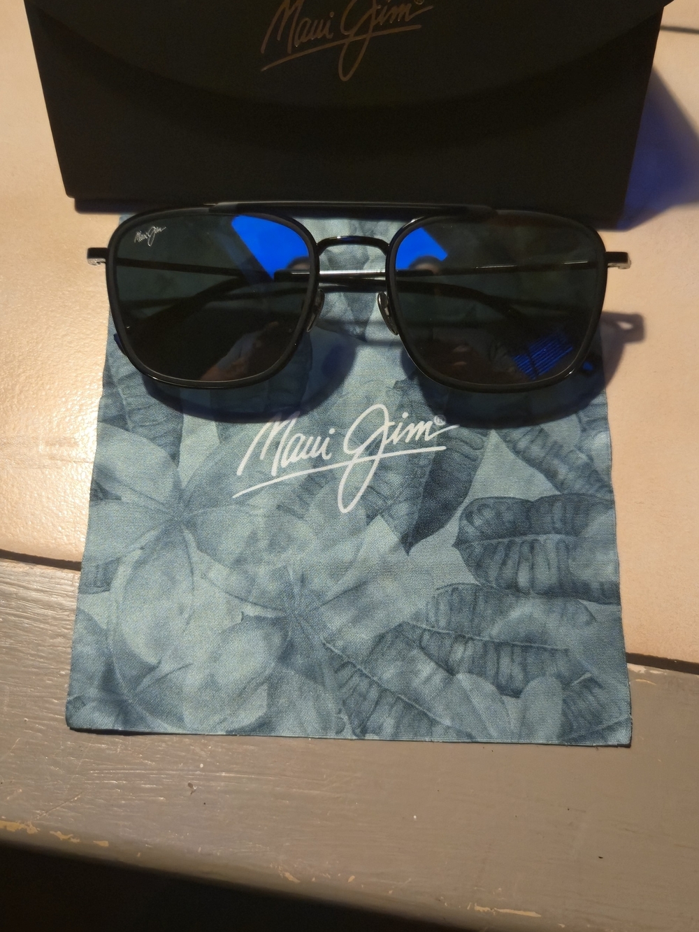 Maui Jim Black Frame Sunglasses with Mirrored Reflective Lenses